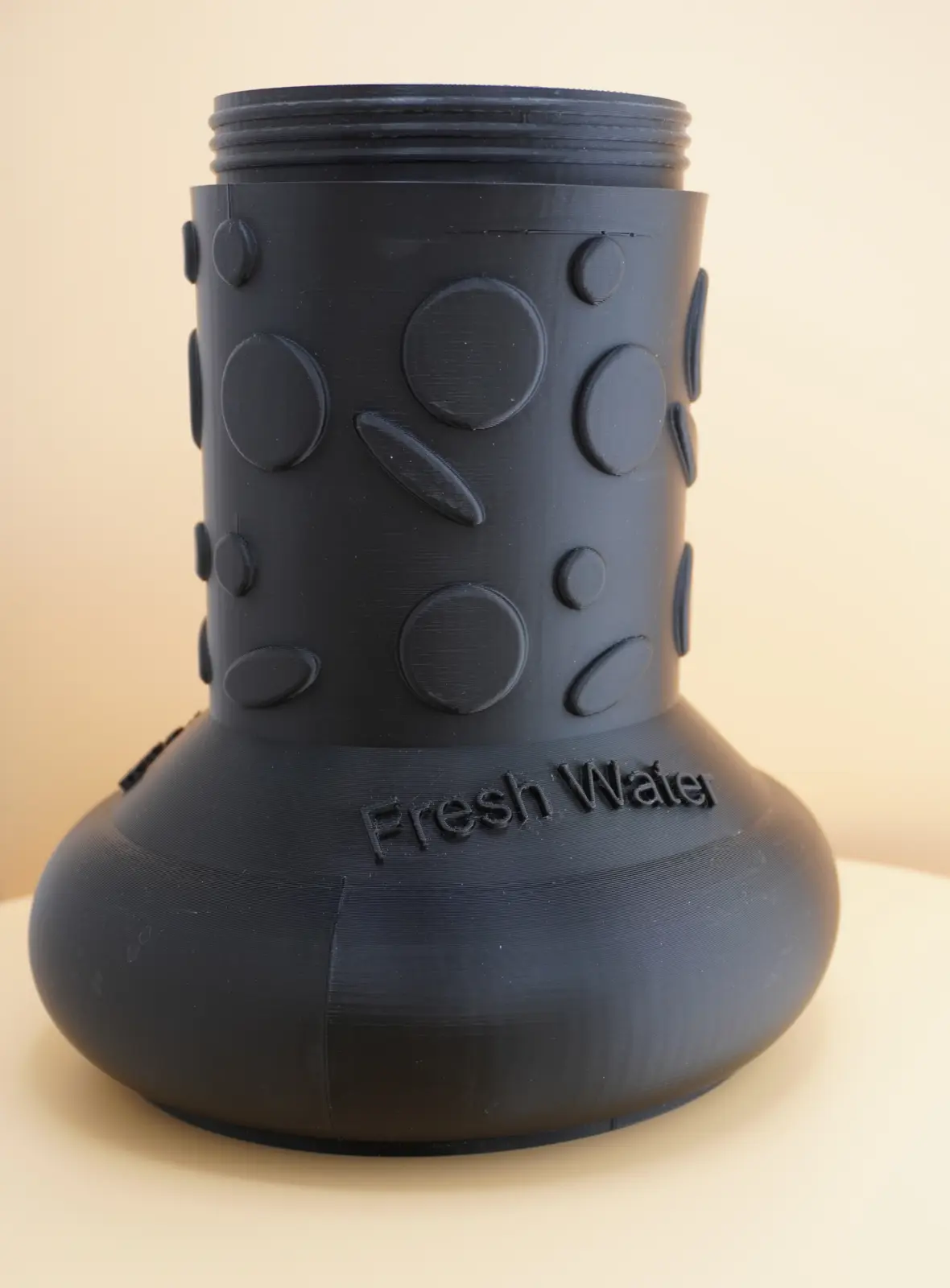 Base of can with Fresh Water label